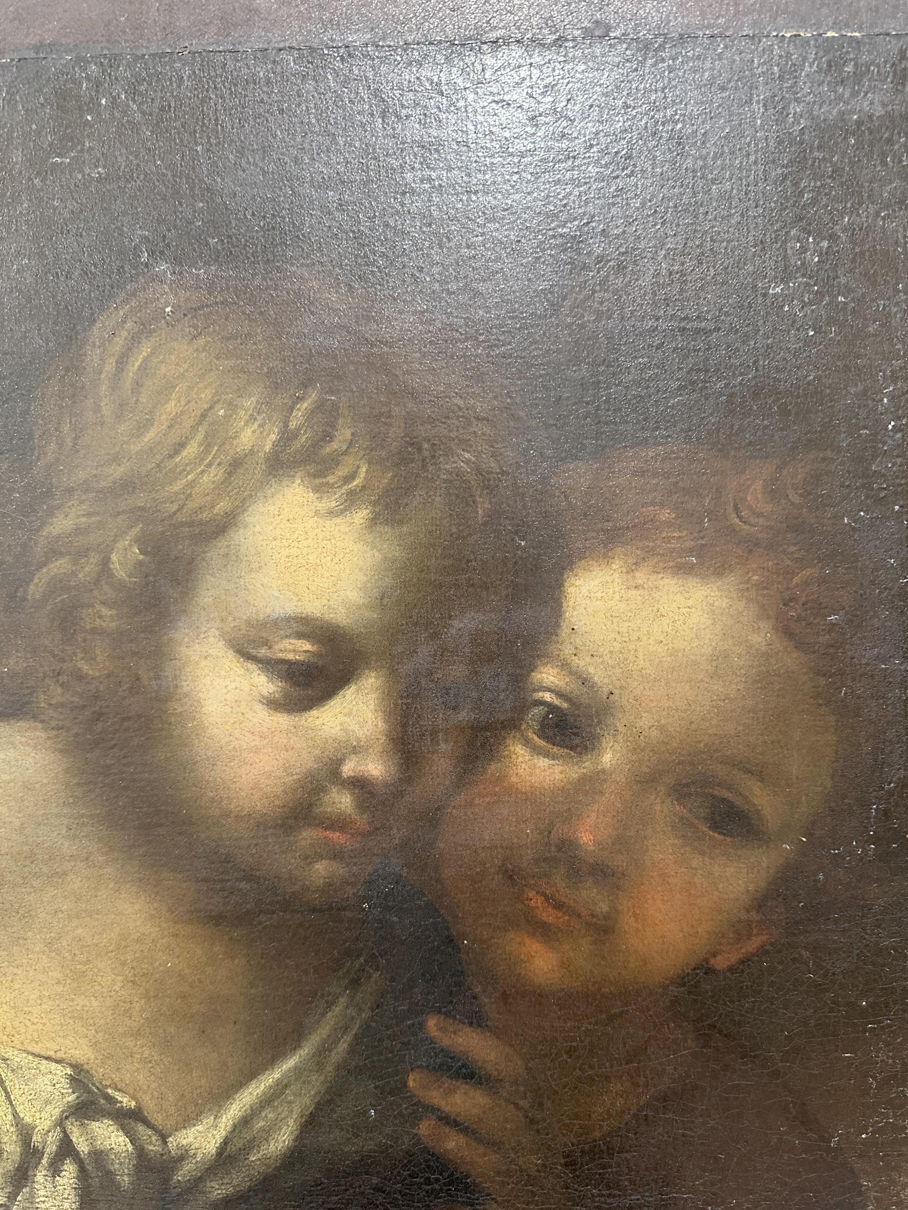 Circle of Domenico Zampieri, called il Domenichino, Italian 1581-1641, 'The Madonna and Child with the infant Saint John the Baptist and Angels'